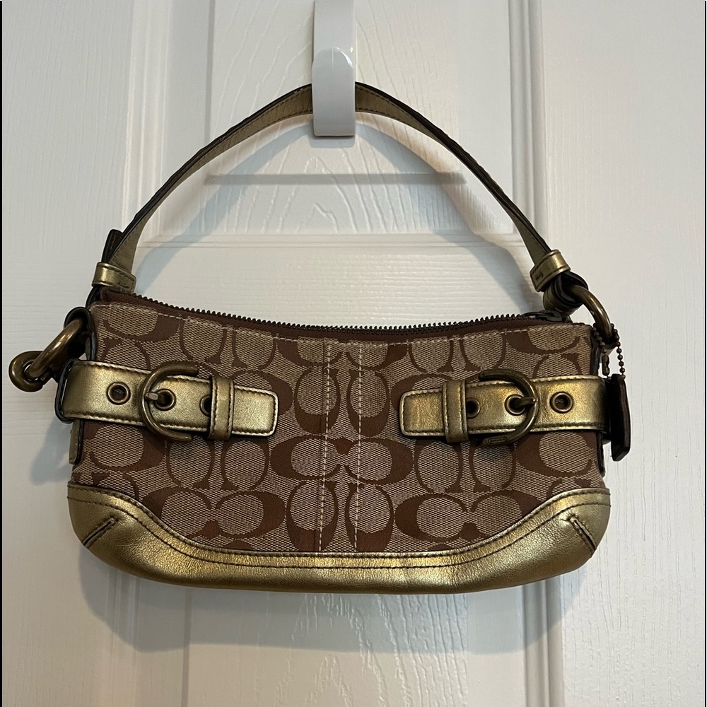 Coach small handbag with strap